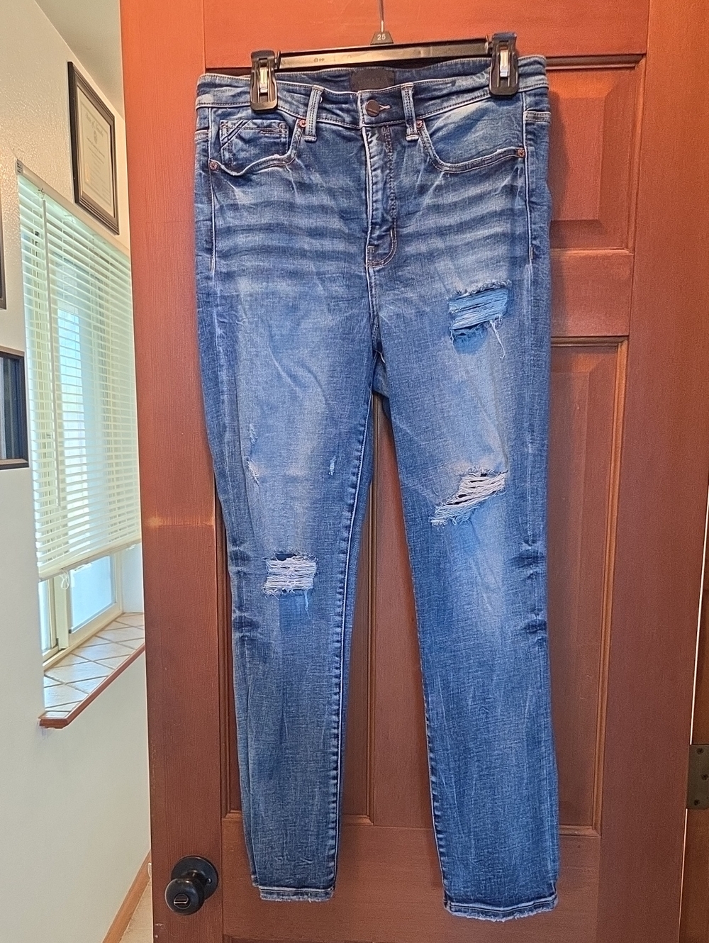 Buckle Black Stretchy Distressed Blue Slim Jeans